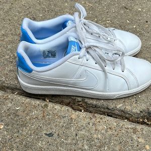 White and blue Nike sneakers